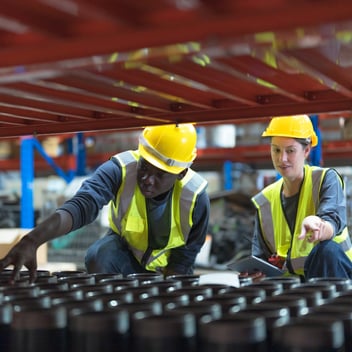 Facility manager analyzing performance metrics on a digital dashboard to improve operational efficiency.