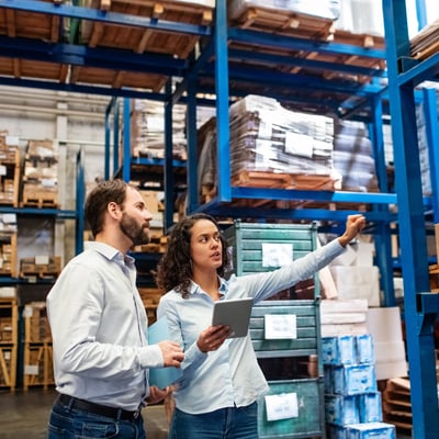 Healthcare facility manager reviewing compliance reports on a digital dashboard