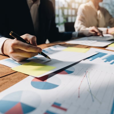 Hospital facility manager reviewing maintenance and compliance plans