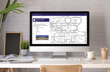 Facility manager analyzing digital dashboard reports