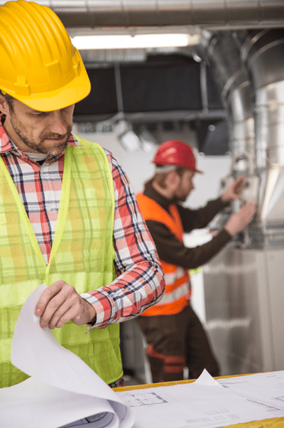  Facility manager conducting a safety compliance inspection at a K-12 school