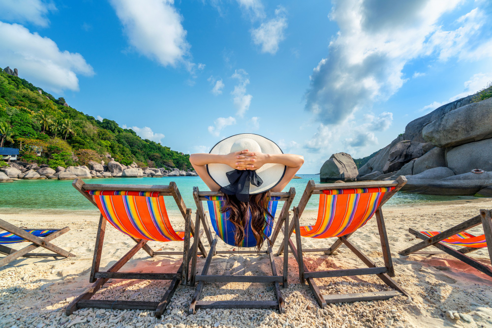 woman-with-hat-sitting-chairs-beach-beautiful-tropical-beach-woman-relaxing-tropical-beach-koh-nangyuan-island